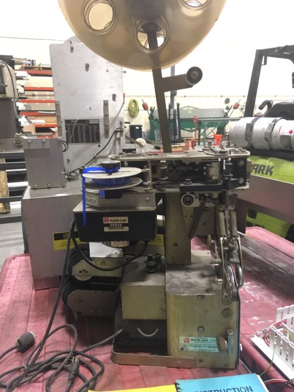 Get a refurbished Kwik Lock 872A Automatic Closure Machine and other used bread bagging & slicing machines from Lenexa Manufacturing Company.