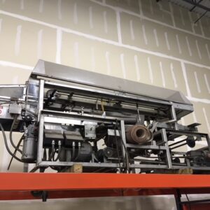 Get the UBE Wide Products Bagger and other used refurbished bread bagging machines for your bakery at Lenexa Manufacturing Company.