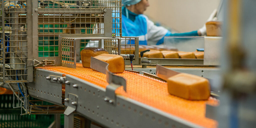 Bread going down a conveyor belt
